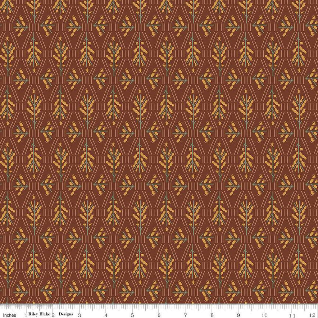 Dark reddish brown colored fabric with geometric flowers and lines in green and yellow. 
Cute Little Fabric Shop