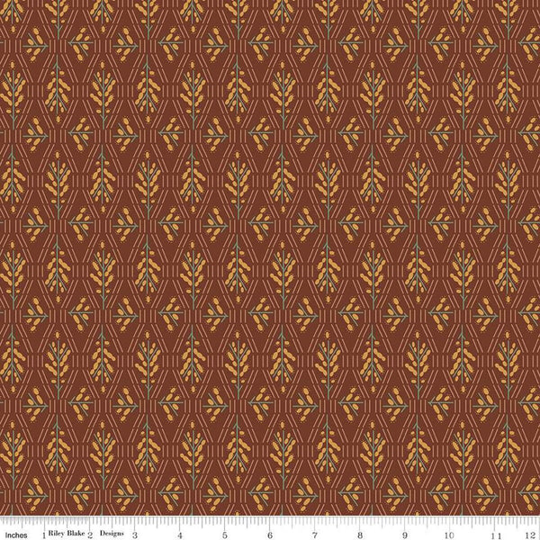 Dark reddish brown colored fabric with geometric flowers and lines in green and yellow. 
Cute Little Fabric Shop