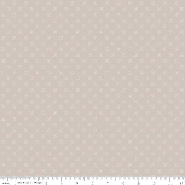 Cream, light tan, sand colored quilting cotton fabric with squares in a grid. Each square is about 1/4" wide. There are white X's within the squares
Cute Little Fabric Shop