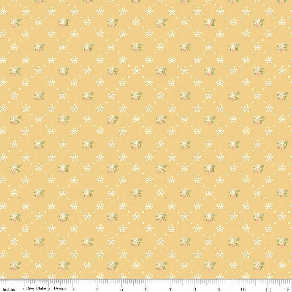 Clover Farm from Riley Blake Designs. Image depicts scattered flowers and X's on a yellow background. Quilting cotton fabric. 
Cute Little Fabric Shop
