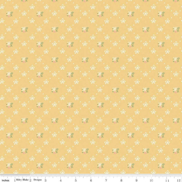 Clover Farm from Riley Blake Designs. Image depicts scattered flowers and X's on a yellow background. Quilting cotton fabric. 
Cute Little Fabric Shop