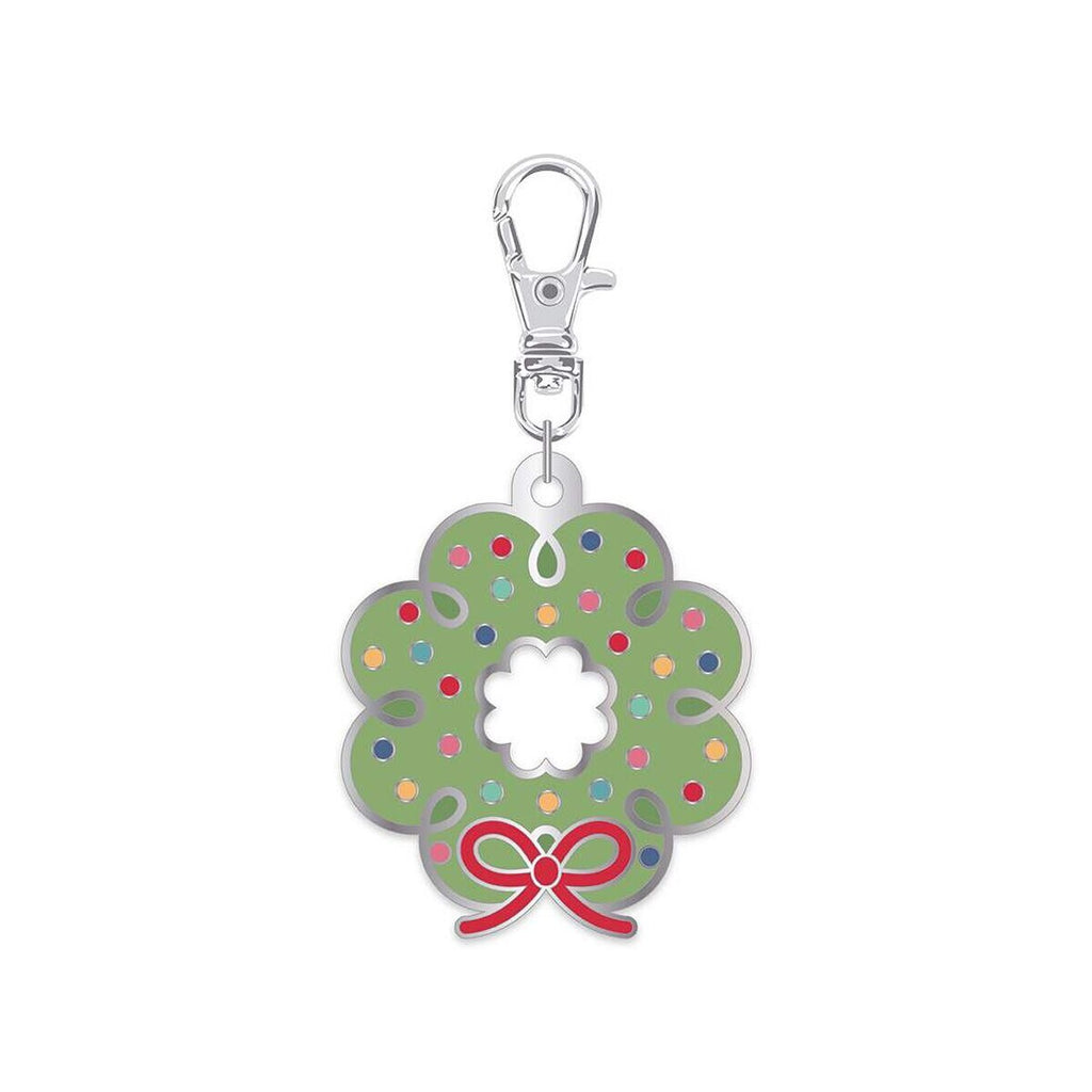 Image of the Lori Holt Enamel Happy Charm™ Wreath by Riley Blake Designs. Features a green wreath with colorful dots and a red bow. 
Cute Little Fabric Shop