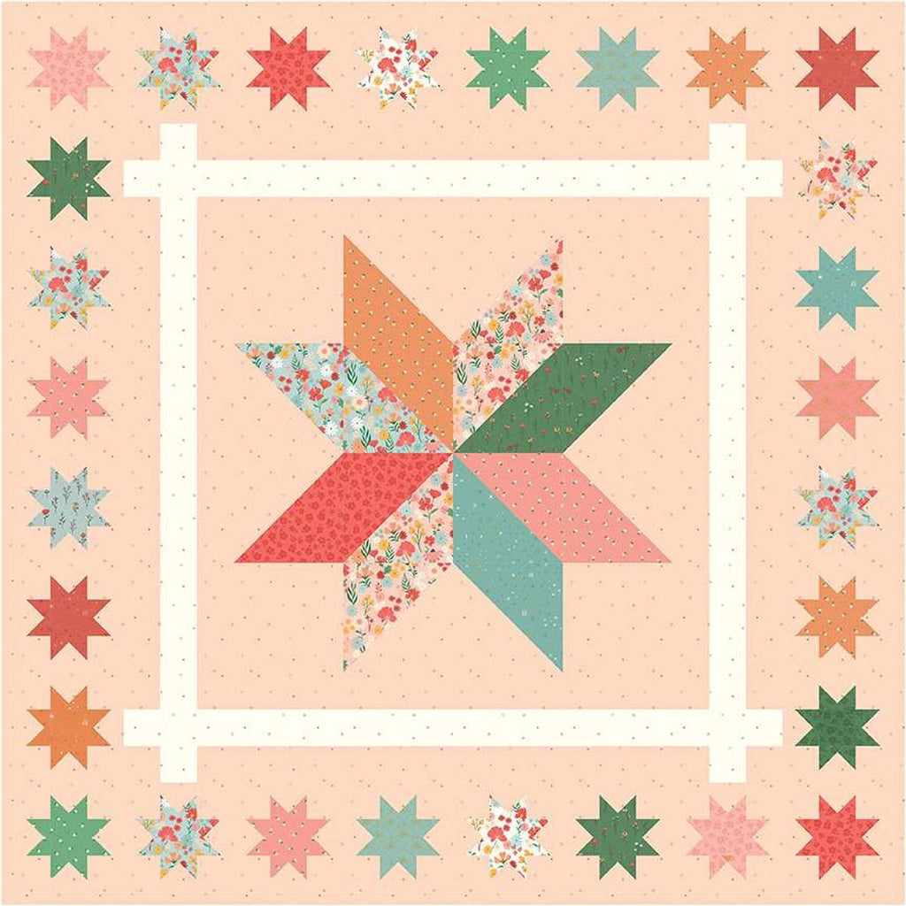 Image of the Primrose Star Quilt Boxed Kit featuring fabric from the Stay Wild collection by Amanda Niederhauser for Riley Blake Designs. Features a light pink background with a large star bordered by small stars. 
Cute Little Fabric Shop
