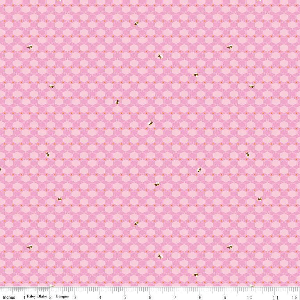 Image of the 100 Aker Woods Honey Hex Pink quilting cotton fabric by Jill Howarth for Riley Blake Designs. Features honeycomb and an occasional bumble bee on a pink background.
Cute Little Fabric Shop