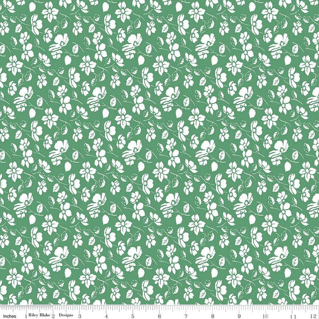 Image of the Always in Season Mono Floral Green quilting cotton fabric by American Jane for Riley Blake Designs. Features white floral sprigs on a medium green background. 
Cute Little Fabric Shop