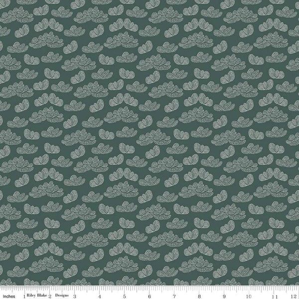 Image of the Garden Dreams Clouds Evergreen quilting cotton fabric by Amber Elliot for Riley Blake Designs. Features pixelated clouds on a dark green background. 
Cute Little Fabric Shop