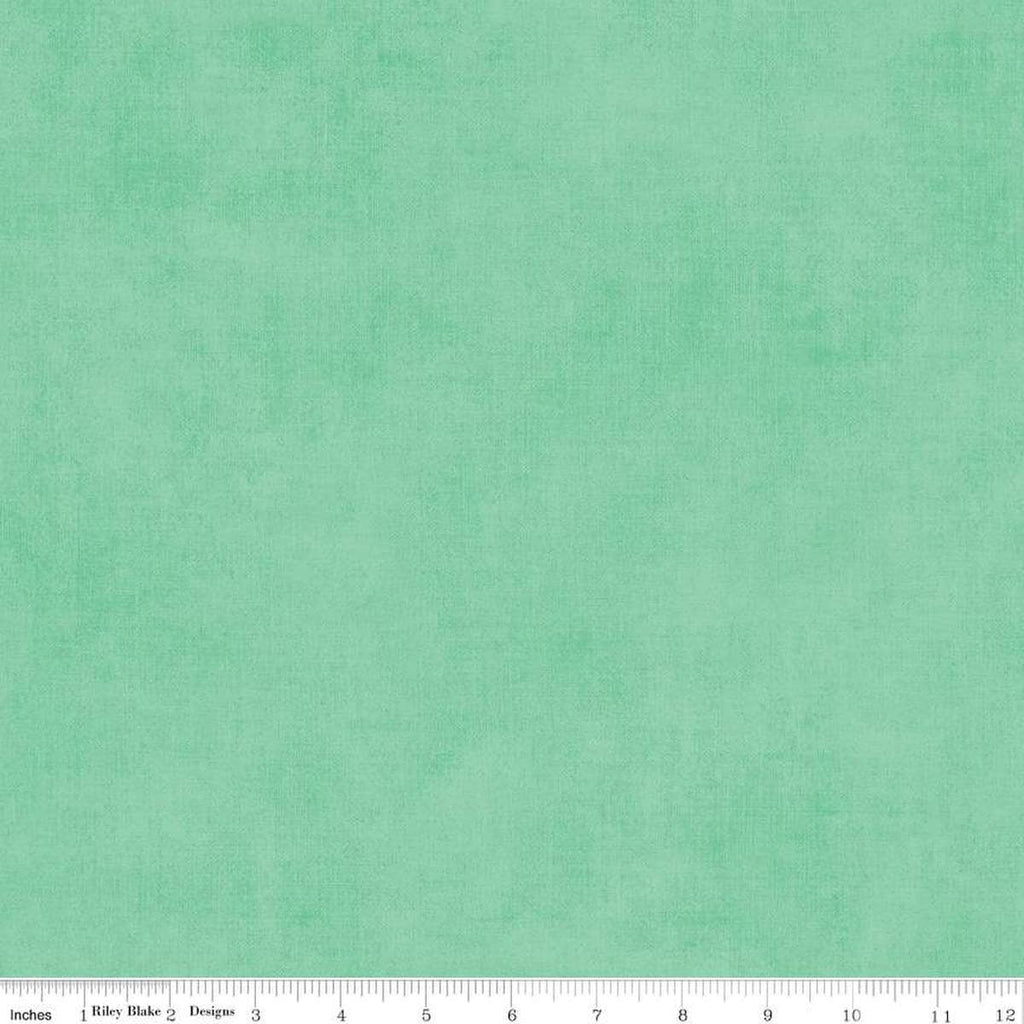 Image of the Shades Sweet Mint quilting cotton fabric by Riley Blake Designs. Features a mint fabric with a mottled semisold background. 
Cute Little Fabric Shop
