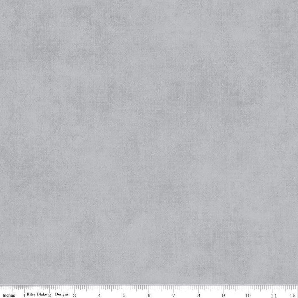 Image of the Shades Silver quilting cotton fabric by Riley Blake Designs. Features a light grey fabric with a mottled semisold background. 
Cute Little Fabric Shop