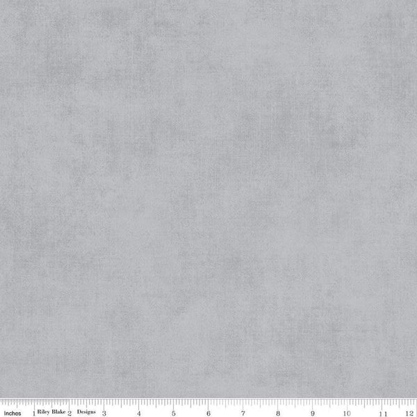 Image of the Shades Silver quilting cotton fabric by Riley Blake Designs. Features a light grey fabric with a mottled semisold background. 
Cute Little Fabric Shop