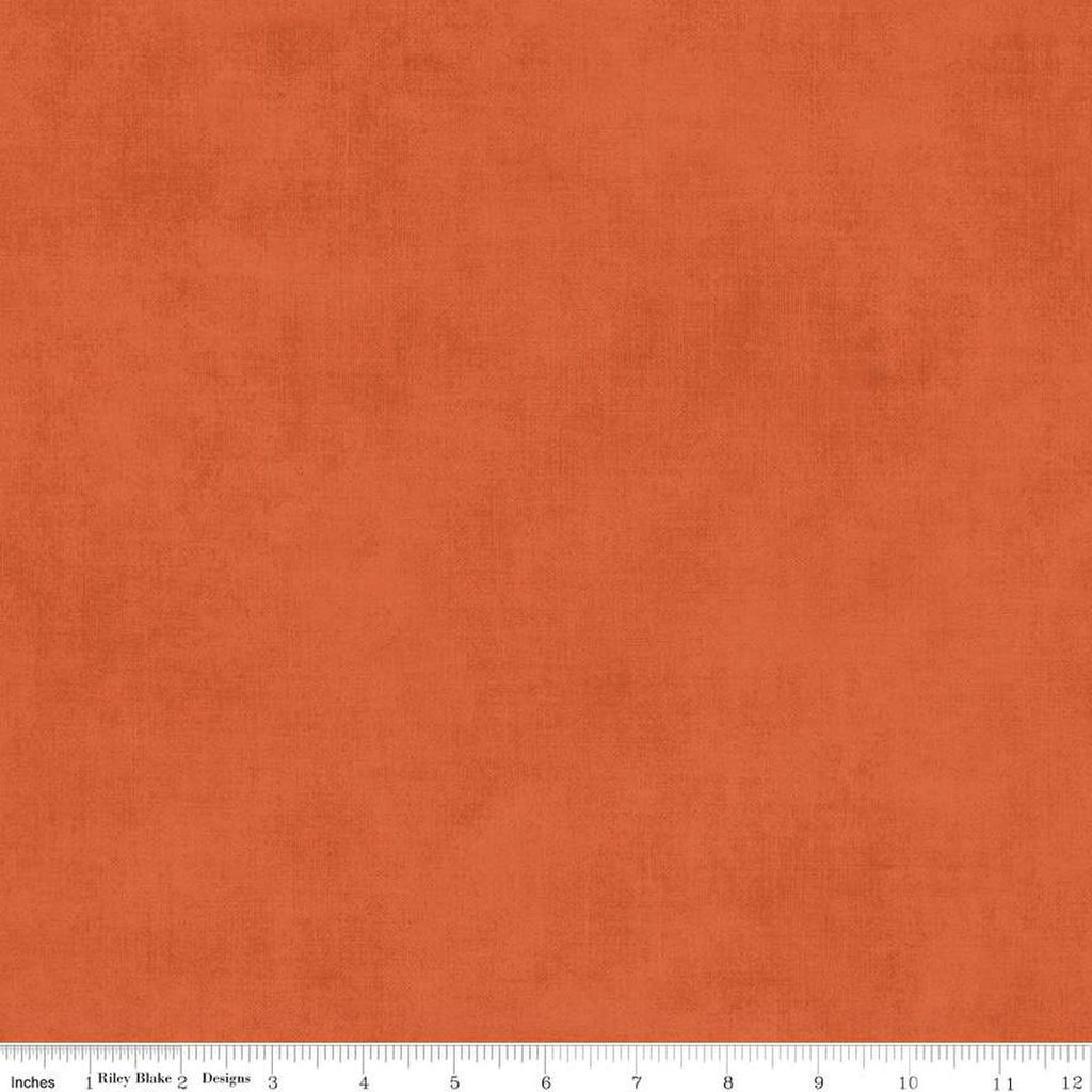 Image of the Shades Autumn quilting cotton fabric by Riley Blake Designs. Features a bright orange fabric with a mottled semisold background. 
Cute Little Fabric Shop