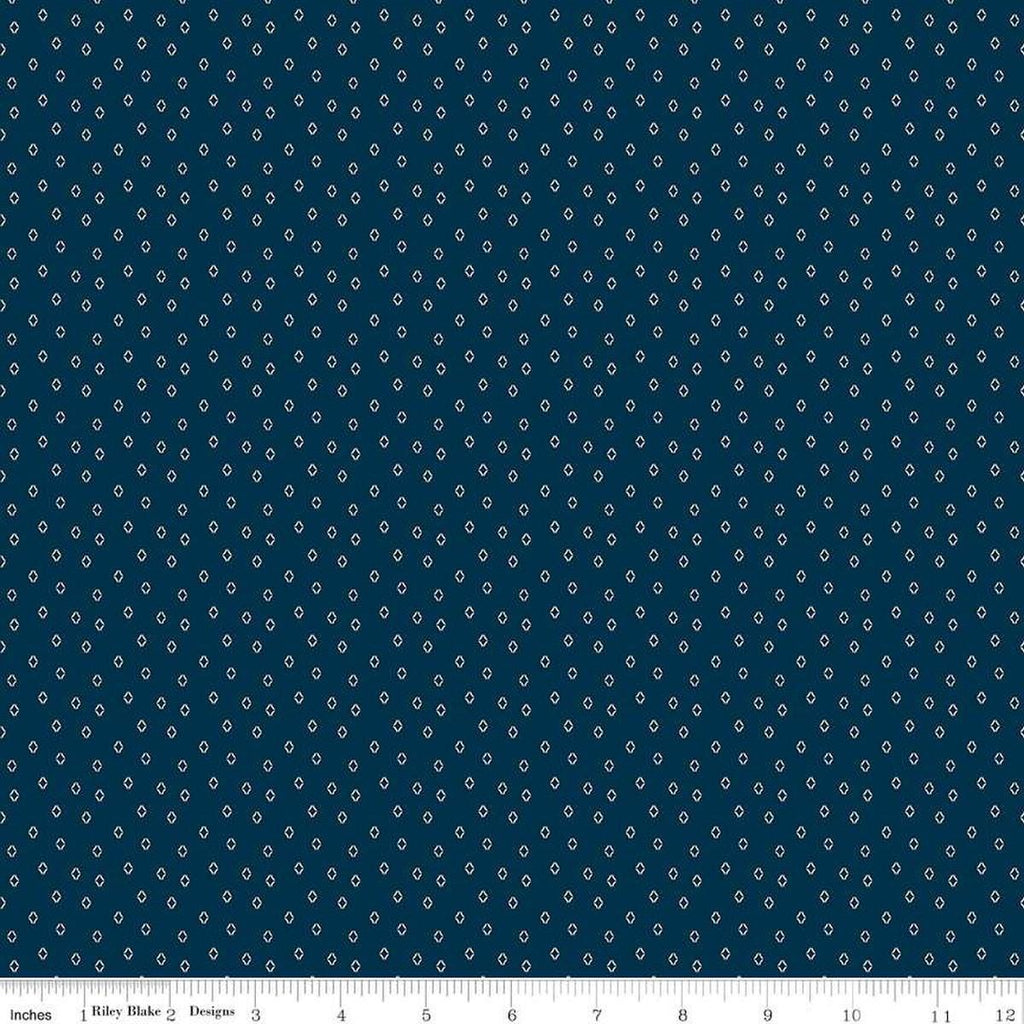 Image of the Cheddar at Twilight Diamonds Navy quilting cotton fabric by Riley Blake Designs. Features small diamonds arranged on a dark blue background. 
Cute Little Fabric Shop