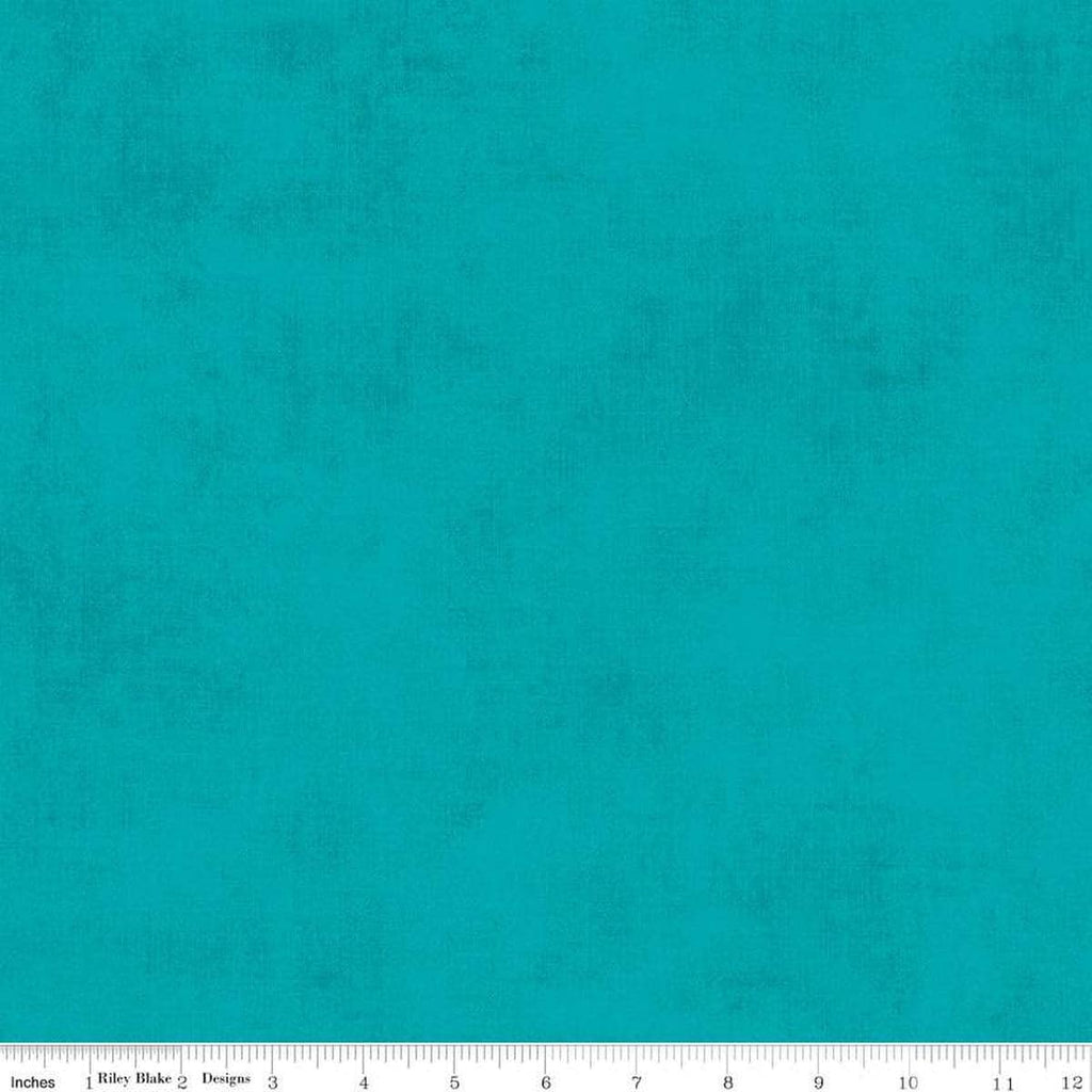 Image of the Shades Mermaid's Tale quilting cotton fabric by Riley Blake Designs. Features a bright teal fabric with a mottled semisold background. 
Cute Little Fabric Shop