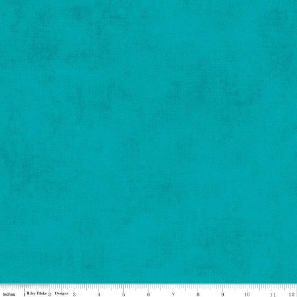 Image of the Shades Mermaid's Tale quilting cotton fabric by Riley Blake Designs. Features a bright teal fabric with a mottled semisold background. 
Cute Little Fabric Shop