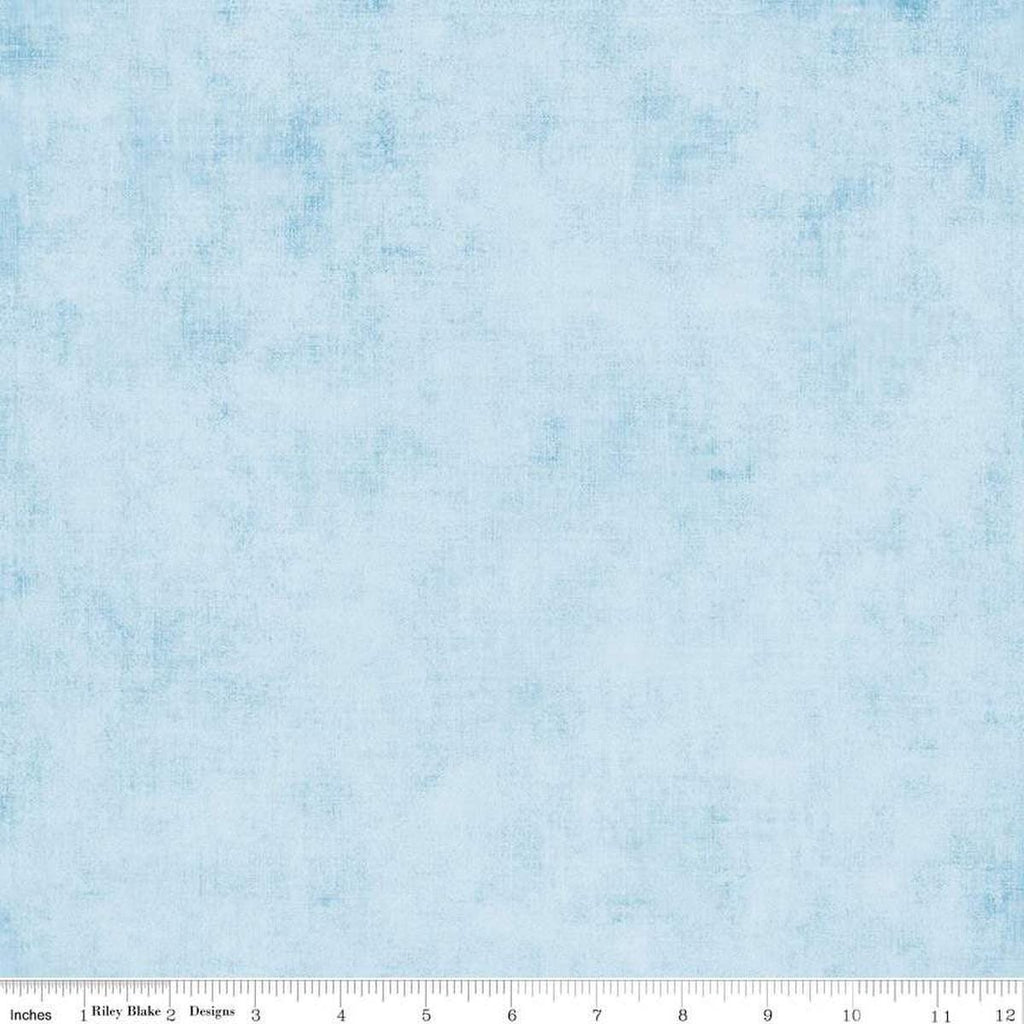 Image of the Shades Boy Blue quilting cotton fabric by Riley Blake Designs. Features a light blue fabric with a mottled semisold background. 
Cute Little Fabric Shop