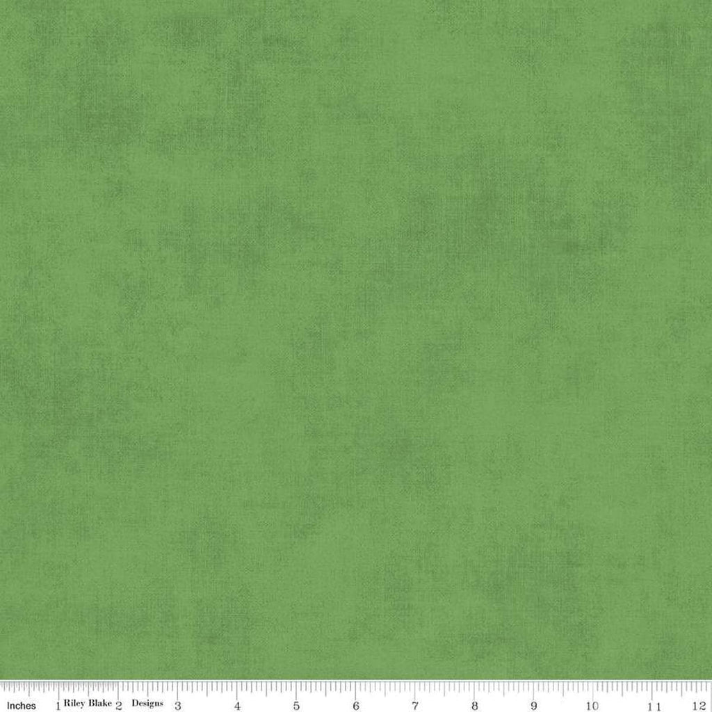 Image of the Shades Basil quilting cotton fabric by Riley Blake Designs. Features a green fabric with a mottled semisold background. 
Cute Little Fabric Shop