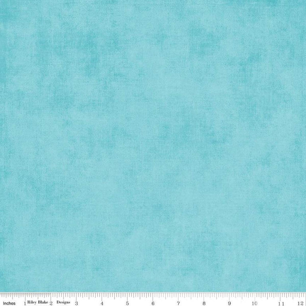 Image of the Shades Aqua quilting cotton fabric by Riley Blake Designs. Features a light blue fabric with a mottled semisold background. 
Cute Little Fabric Shop