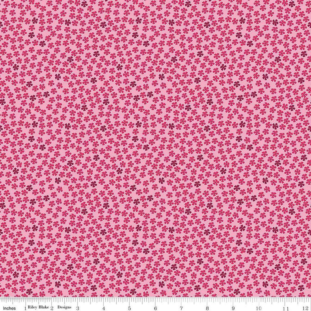 Image of the Perennial Mini Rose quilting cotton fabric by Jill Finley for Riley Blake Designs. Features small flowers on a light pink background. 
Cute Little Fabric Shop