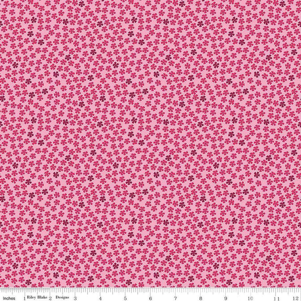 Image of the Perennial Mini Rose quilting cotton fabric by Jill Finley for Riley Blake Designs. Features small flowers on a light pink background. 
Cute Little Fabric Shop