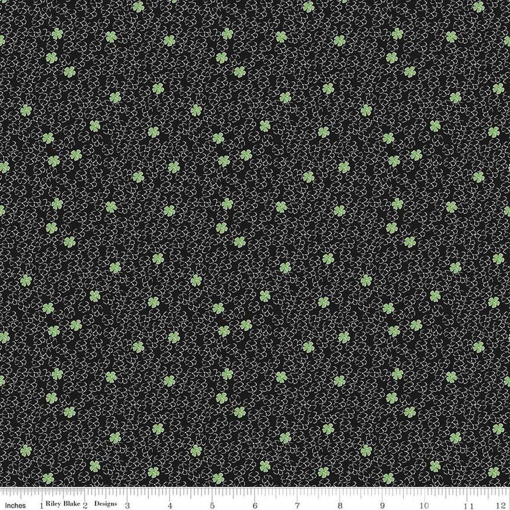 Image of the Perennial Mini Black quilting cotton fabric by Jill Finley for Riley Blake Designs. Features small flowers on a black background. 
Cute Little Fabric Shop