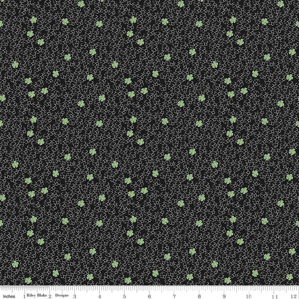 Image of the Perennial Mini Black quilting cotton fabric by Jill Finley for Riley Blake Designs. Features small flowers on a black background. 
Cute Little Fabric Shop