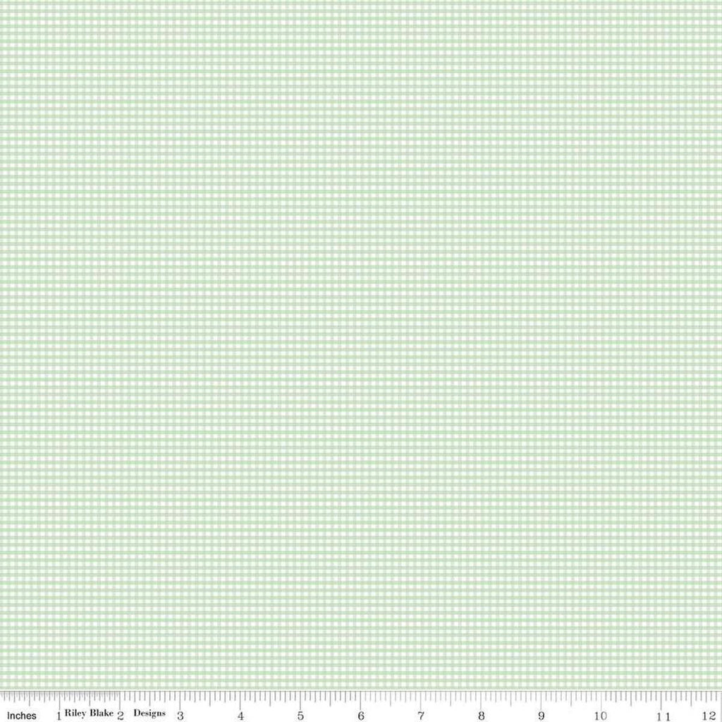 Image of the Micro Gingham Mint quilting cotton fabric by Riley Blake Designs. Features a micro one sixteenth of an inch gingham with light green on white. 
Cute Little Fabric Shop