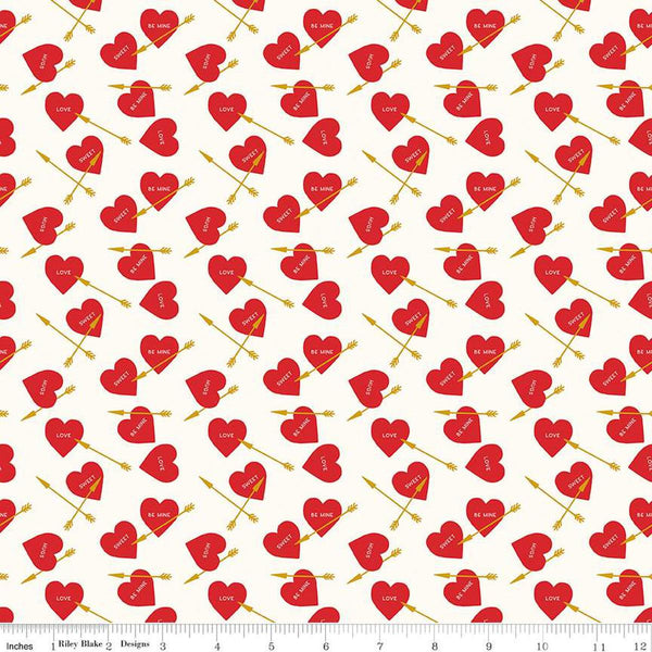 Image of the Sweetheart Heart Arrows Pink quilting cotton fabric by My Minds Eye for Riley Blake Designs. Features conversation hearts and arrows on a cream background.
Cute Little Fabric Shop