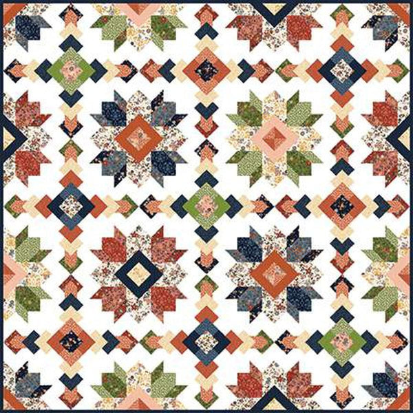 Image of the Blooms quilt pattern by Judy Madsen for Riley Blake Designs. Features stars, diamonds, and square patterns on a quilt. 
Cute Little Fabric Shop