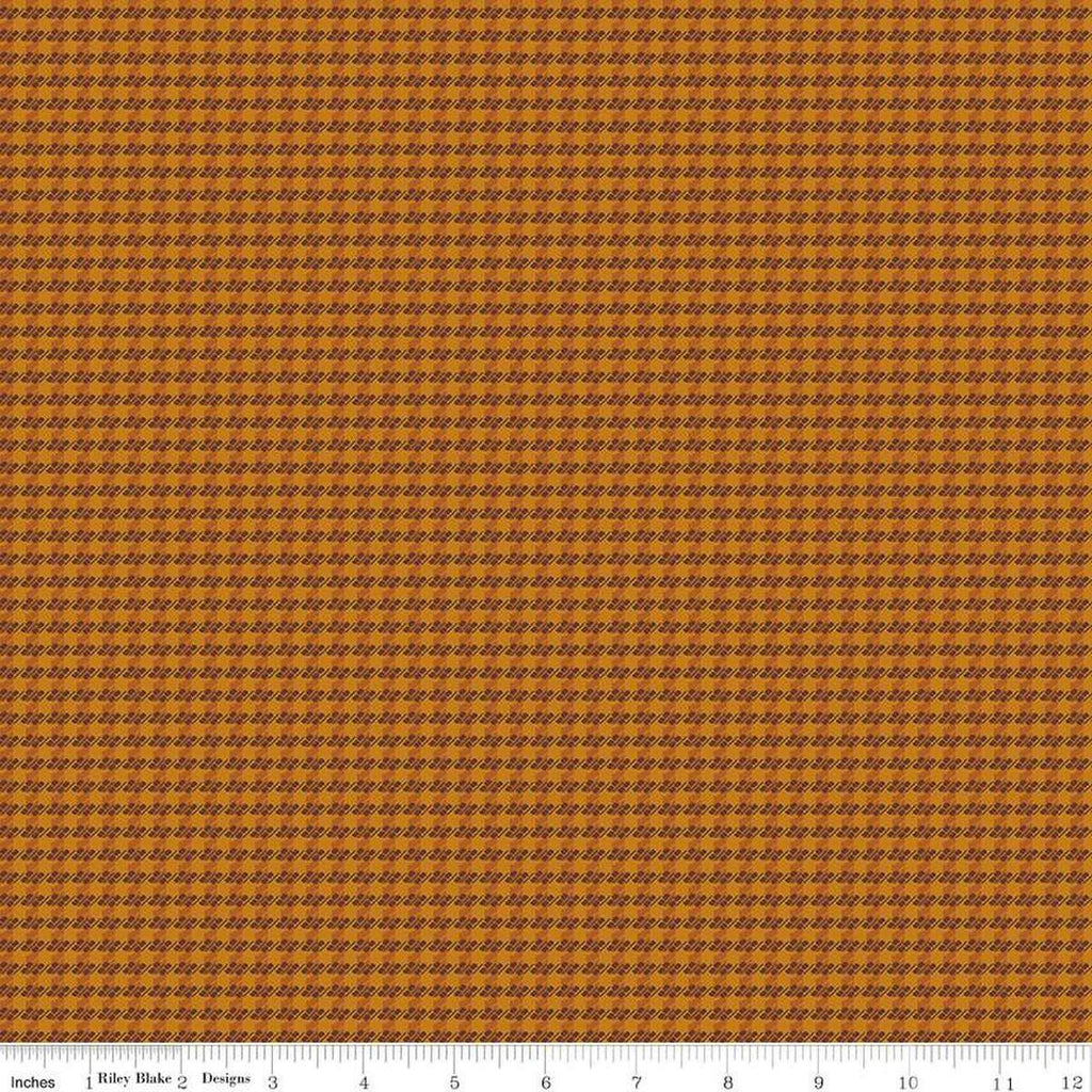 Image of the Stitchers Flannel Houndstooth Spice flannel fabric by Vicki McCarty for Riley Blake Designs. Features small houndstooth patterns on a brown orange background.
Cute Little Fabric Shop