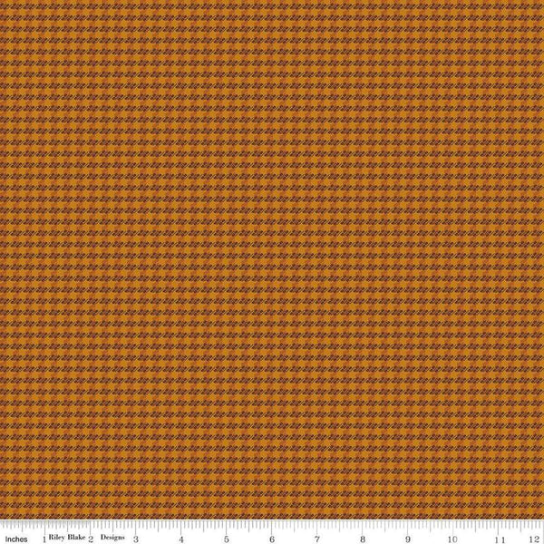 Image of the Stitchers Flannel Houndstooth Spice flannel fabric by Vicki McCarty for Riley Blake Designs. Features small houndstooth patterns on a brown orange background.
Cute Little Fabric Shop
