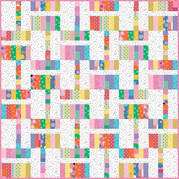 Image of the Colour Magic Quilt Pattern by Sue Daley Designs for Riley Blake Designs. Features rectangles in strips on a square quilt. 
Cute Little Fabric Shop