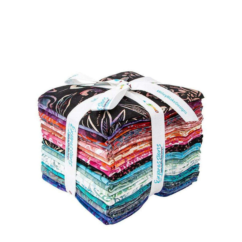 Image of the Expressions Batiks Chalk and Charcoal 10 inch Stacker C. Features floral batik flowers with red, orange, blue, purple, purple, and pink colors. 
Cute Little Fabric Shop