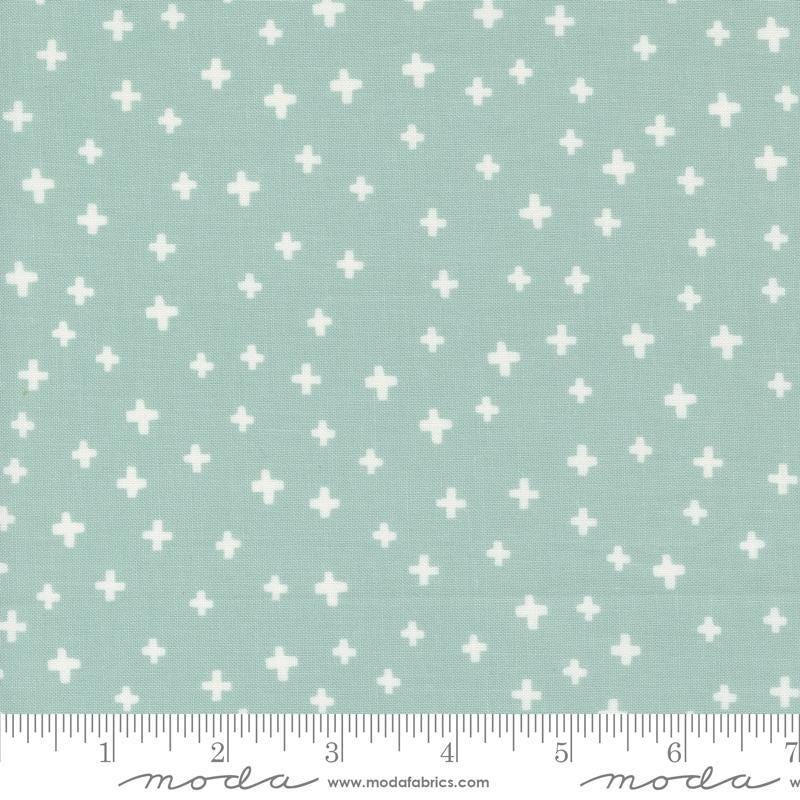 Image of the Shine Plus Sky quilting cotton fabric by Sweetwater for Moda Fabrics. Features small plus signs on a blue background. 
Cute Little Fabric Shop