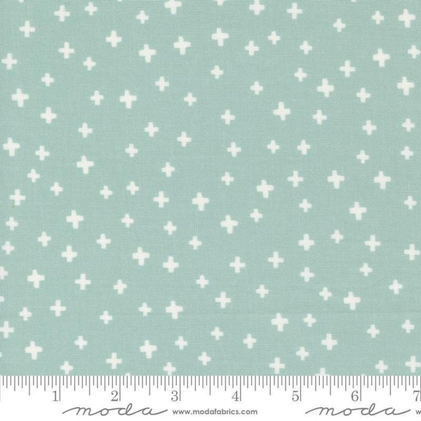 Image of the Shine Plus Sky quilting cotton fabric by Sweetwater for Moda Fabrics. Features small plus signs on a blue background. 
Cute Little Fabric Shop
