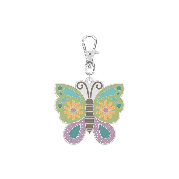 Features the Enamel Happy Charm™ Butterfly by Lori Holt for Riley Blake Designs. Features a butterfly charm. 
Cute Little Fabric Shop