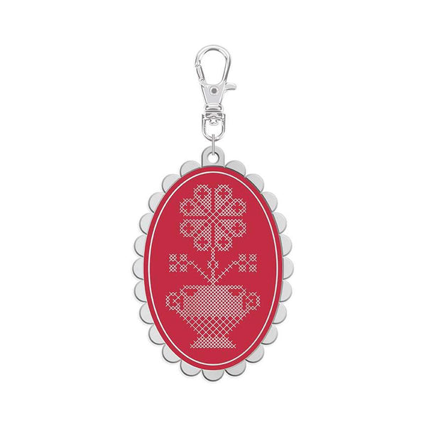 Features the Enamel Happy Charm™ Cross Stitch by Lori Holt for Riley Blake Designs. Features a  floral cross stitch charm. 
Cute Little Fabric Shop