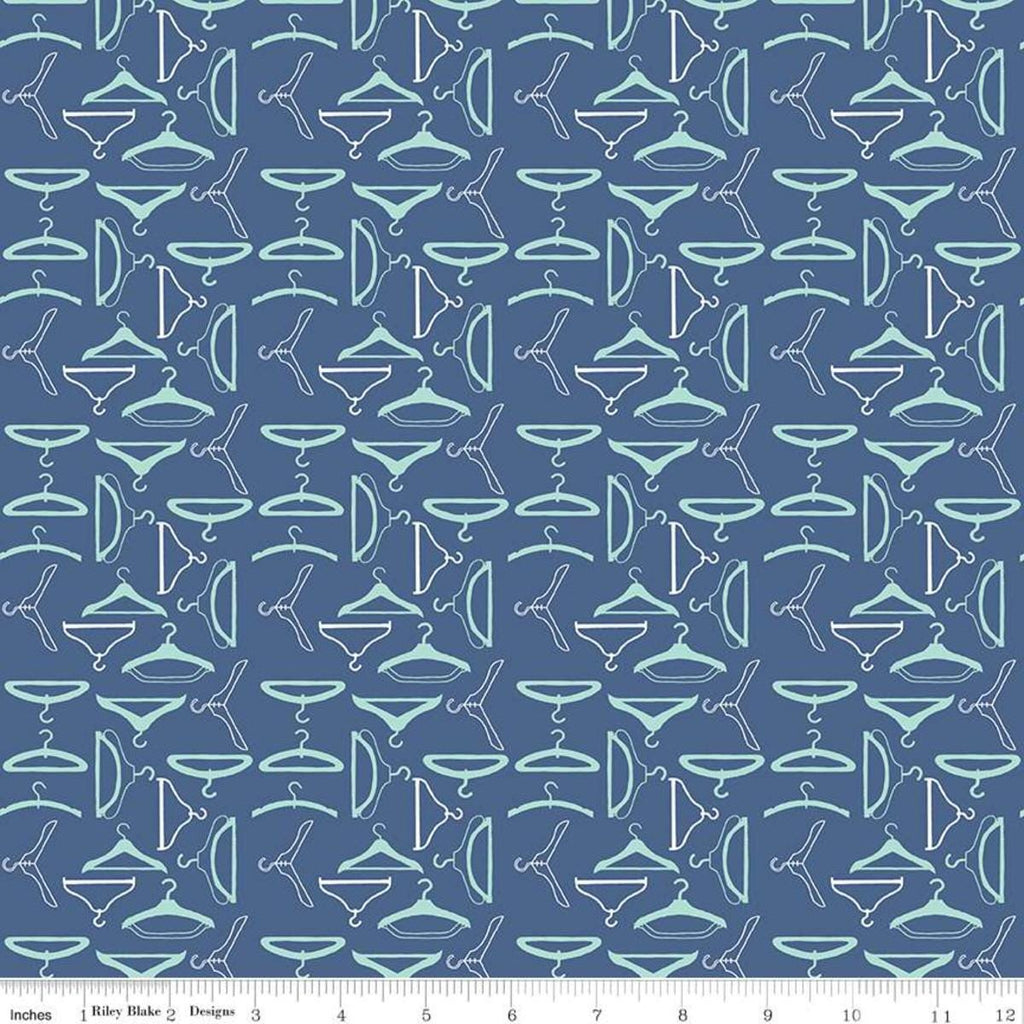 Image of the Vintage Happy 2 Hangers Denim quilting cotton fabric by Lori Holt for Riley Blake Designs. Features clothing hangers on a blue background.  
Cute Little Fabric Shop