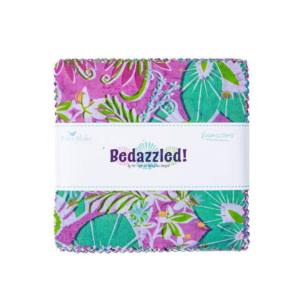 Image of the Batik Expressions Bedazzled! fabric by Riley Blake Designs. Features purple and green colored batik fabrics. 
Cute Little Fabric Shop