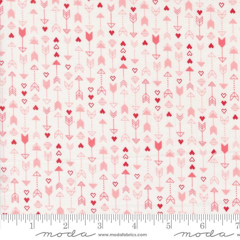 Image of the Love Blooms Arrow Lace quilting cotton fabric by Moda Fabrics. Features arrows on a white background. Cute Little Fabric Shop