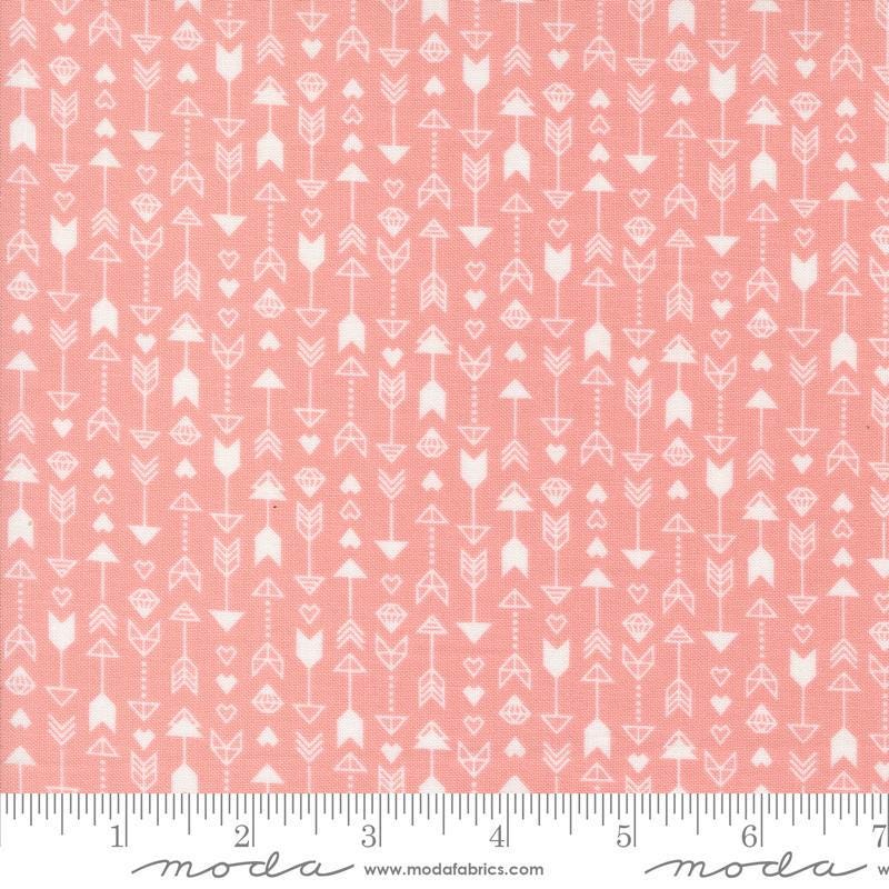Image of the Love Blooms Arrow Blush quilting cotton fabric by Moda Fabrics. Features arrows on a pink background. Cute Little Fabric Shop