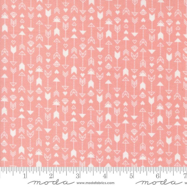 Image of the Love Blooms Arrow Blush quilting cotton fabric by Moda Fabrics. Features arrows on a pink background. Cute Little Fabric Shop
