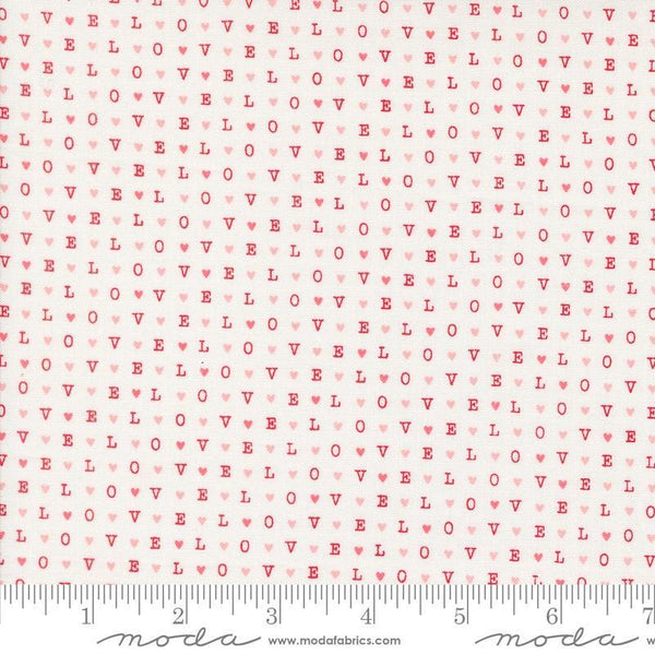 Image of the Love Blooms LOVE Lace quilting cotton fabric by Moda Fabrics. Features the word LOVE on a white background. Cute Little Fabric Shop