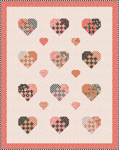 Image of the Holding Hearts quilt pattern by Frannie B Quilting Co for Riley Blake Designs. Features hearts on a quilt. 
Cute Little Fabric Shop