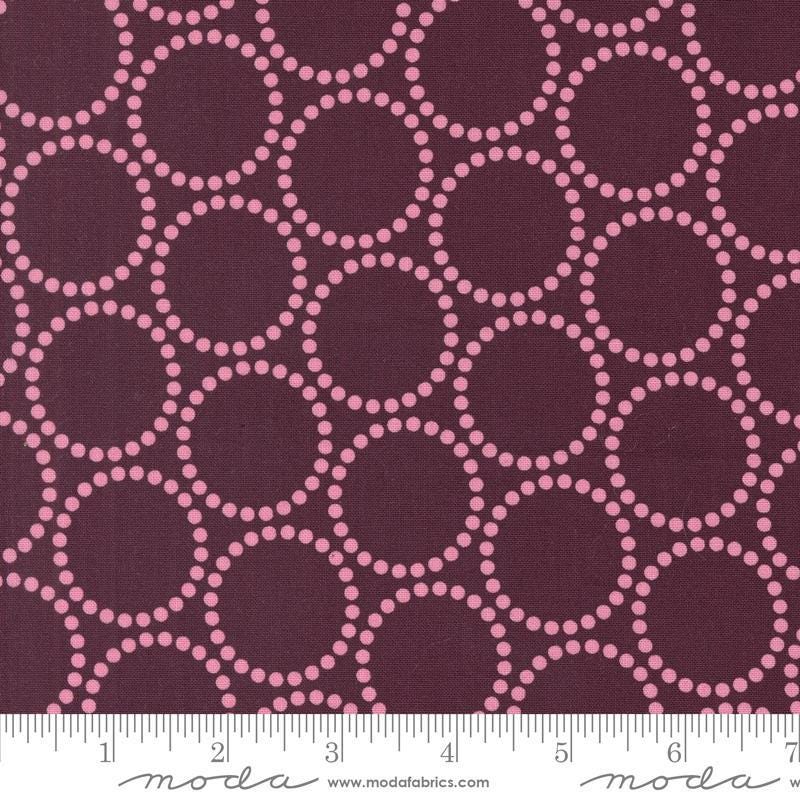 Image of the Love Letter Dots Merlot quilting cotton fabric by Lizzy House for Moda Fabrics. Features dotted circles on a purple background. Cure Little Fabric Shop