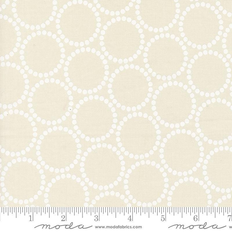 Image of the Love Letter Dots Eggshell White quilting cotton fabric by Lizzy House for Moda Fabrics. Features dotted circles on a cream background. Cure Little Fabric Shop