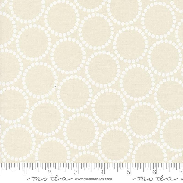 Image of the Love Letter Dots Eggshell White quilting cotton fabric by Lizzy House for Moda Fabrics. Features dotted circles on a cream background. Cure Little Fabric Shop