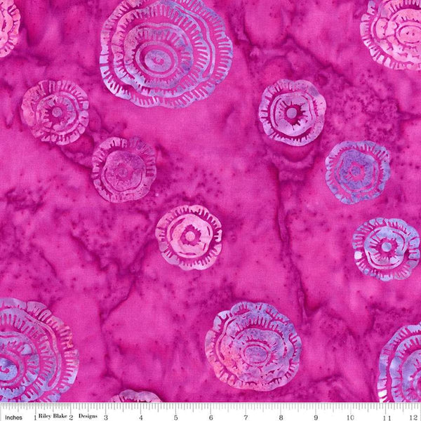 Image of the Expressions Batiks Bedazzled! Lollipop quilting cotton fabric by Pat Fryer for Riley Blake Designs. Features a flower pattern on a pink background. 
Cute Little Fabric Shop