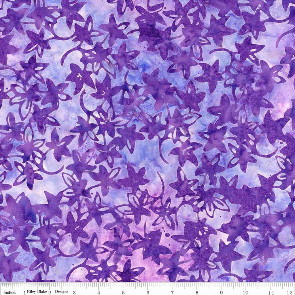 Image of the Expressions Batiks Bedazzled! Purple Haze quilting cotton fabric by Pat Fryer for Riley Blake Designs. Features a flower star pattern on a purple background. 
Cute Little Fabric Shop