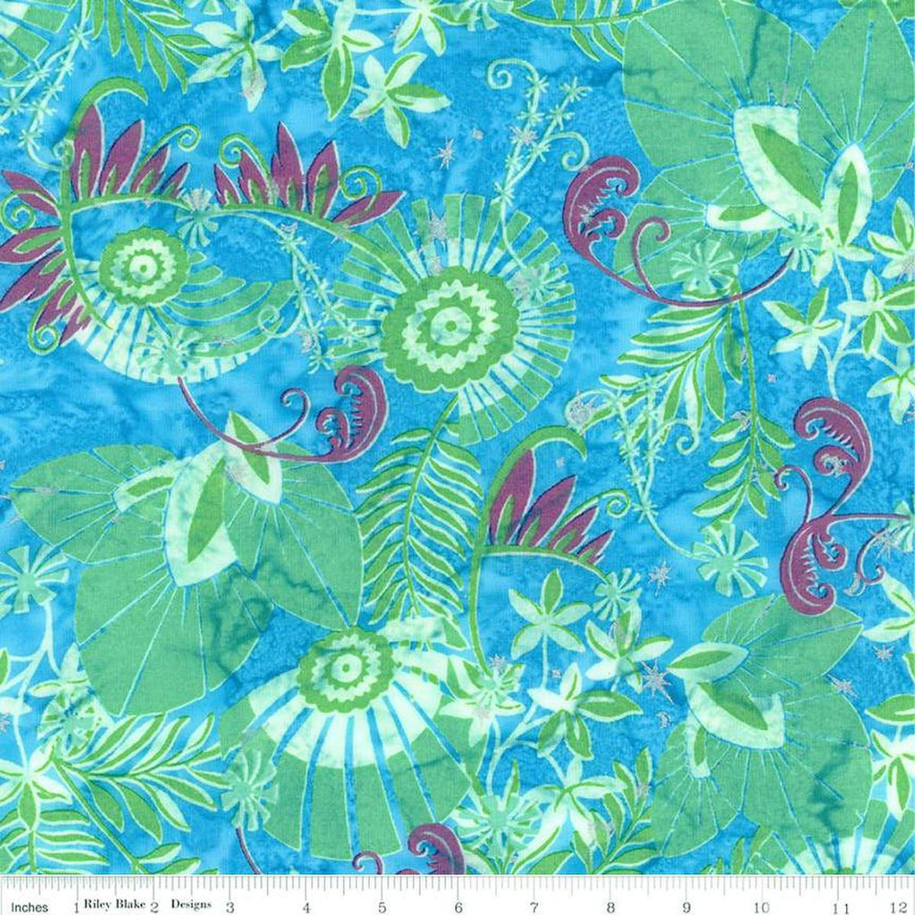 Image of the Expressions Batiks Bedazzled! Stardust Splash quilting cotton fabric by Pat Fryer for Riley Blake Designs. Features a flower pattern on a blue background. 
Cute Little Fabric Shop