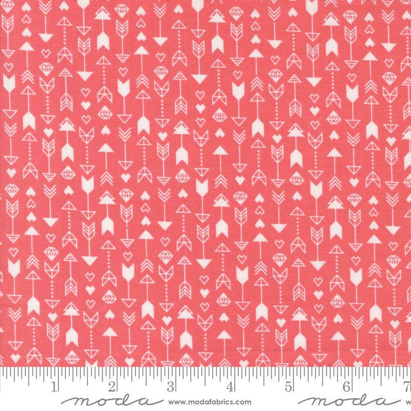 Image of the Love Blooms Arrow Lipstick quilting cotton fabric by Moda Fabrics. Features arrows on a red background. Cute Little Fabric Shop