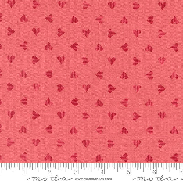 Image of the Love Blooms Sweetheart Lipstick quilting cotton fabric by Moda Fabrics. Features a checkered pattern on a red background. Cute Little Fabric Shop